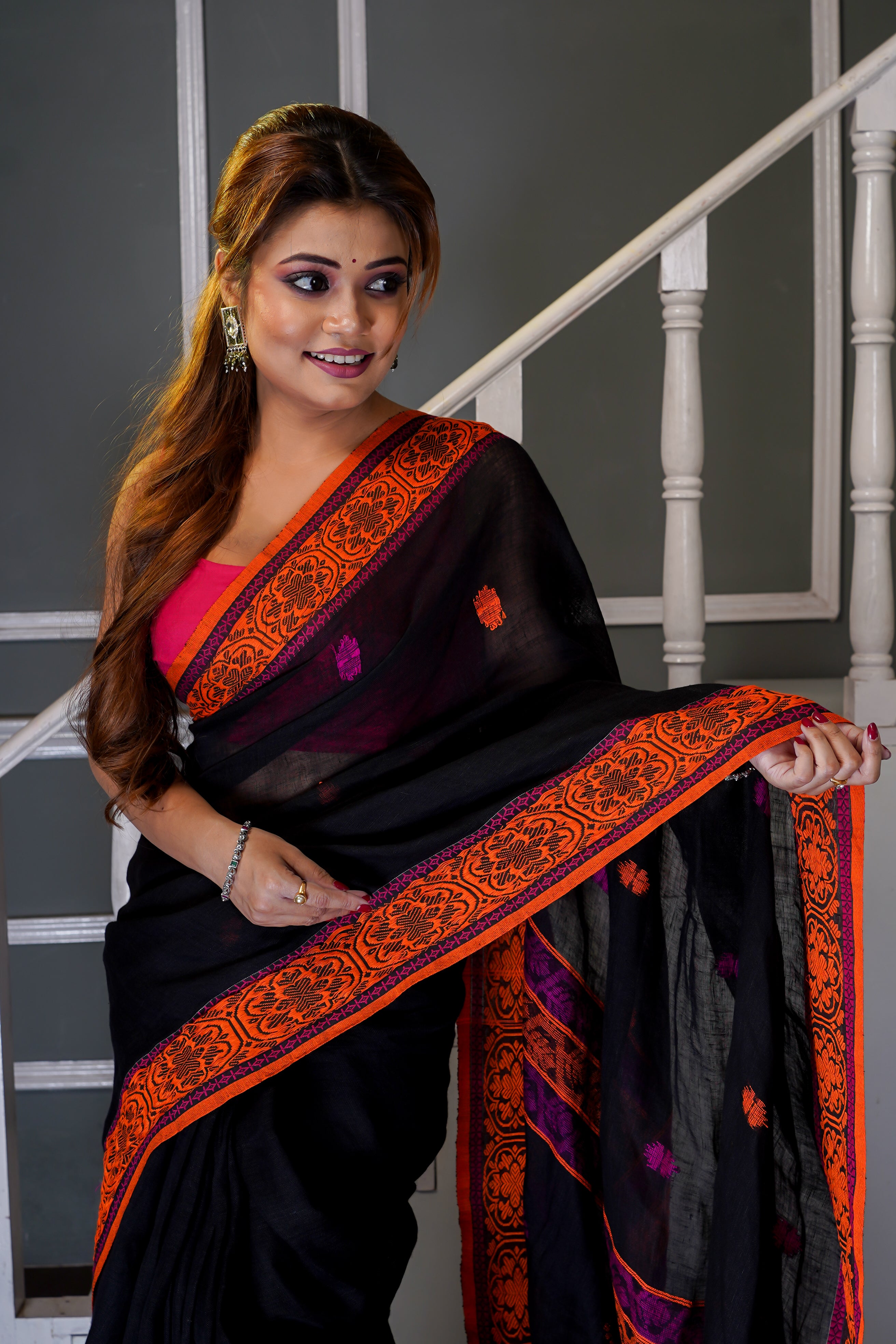 Black &  Orange linen hand woven jamdani saree