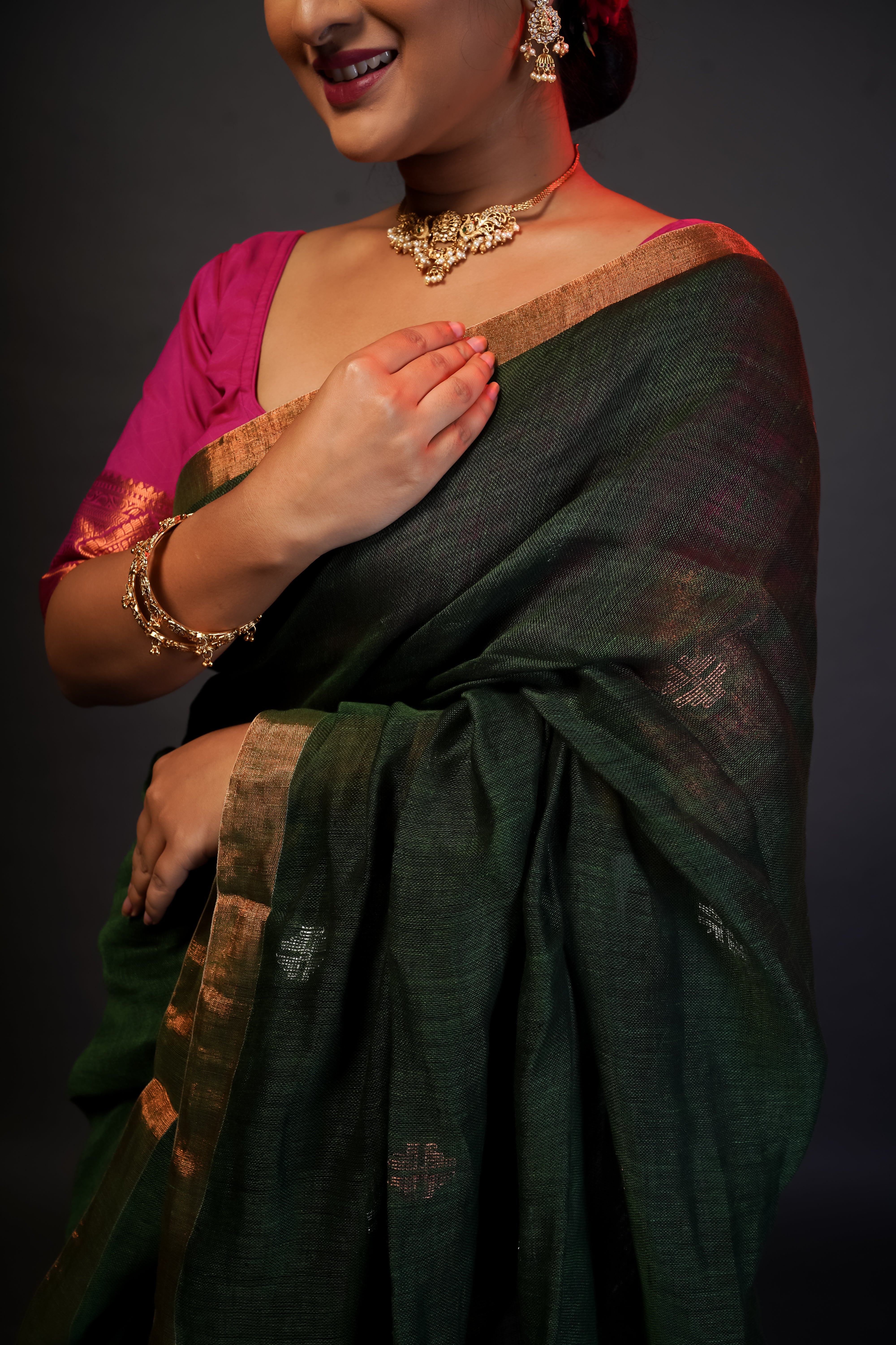 Dark green sawstik linen hand woven jamdani saree