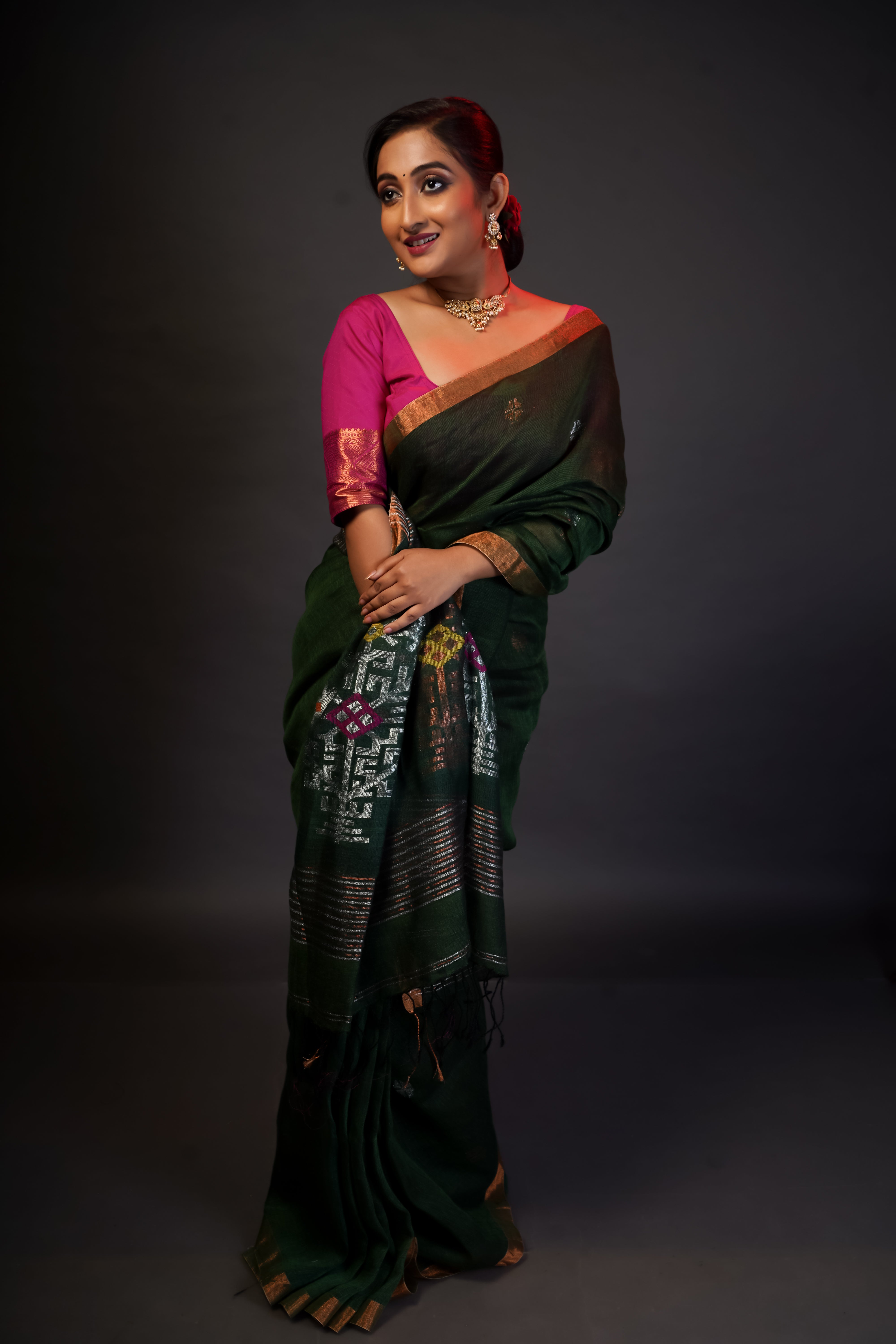 Dark green sawstik linen hand woven jamdani saree