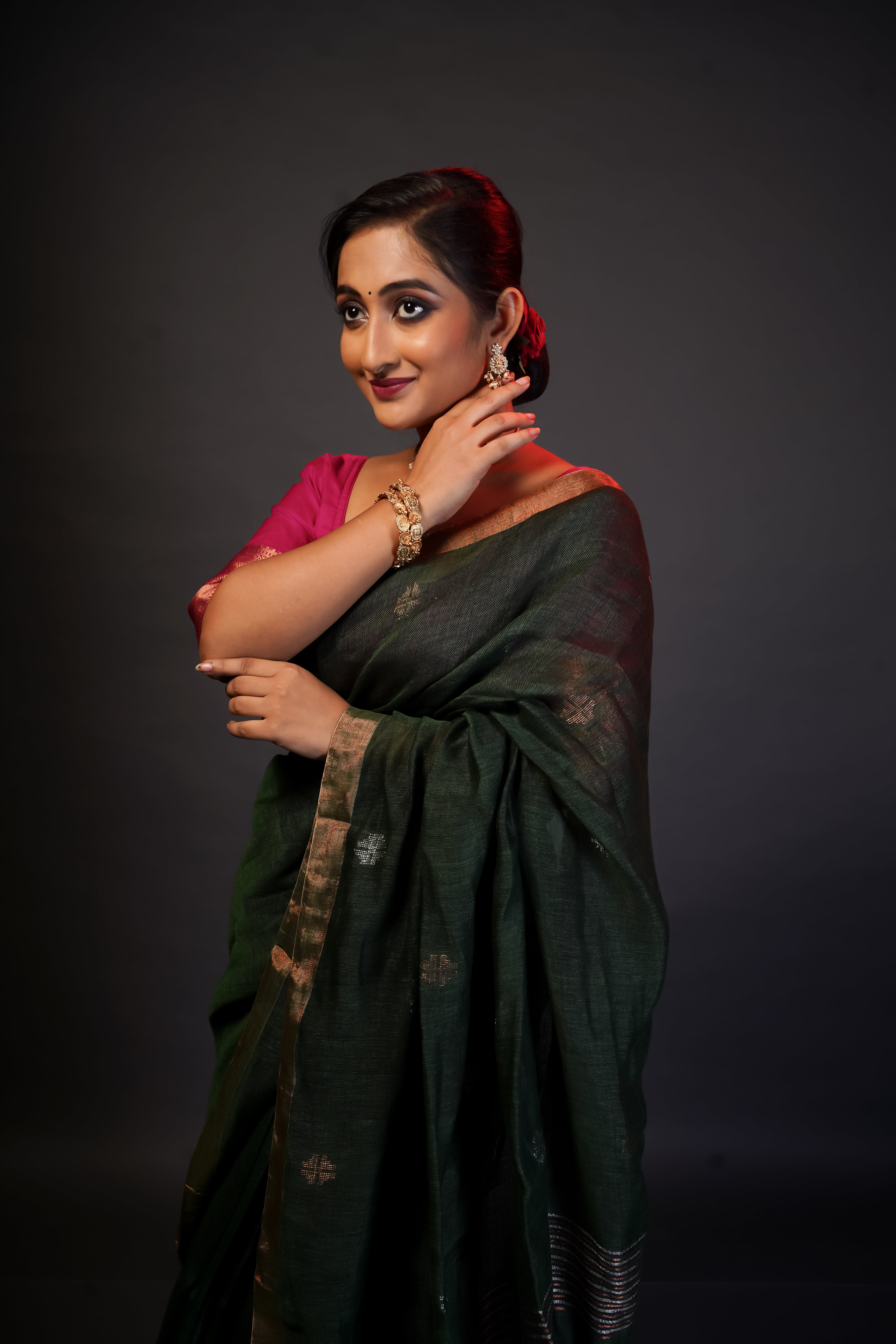 Dark green sawstik linen hand woven jamdani saree