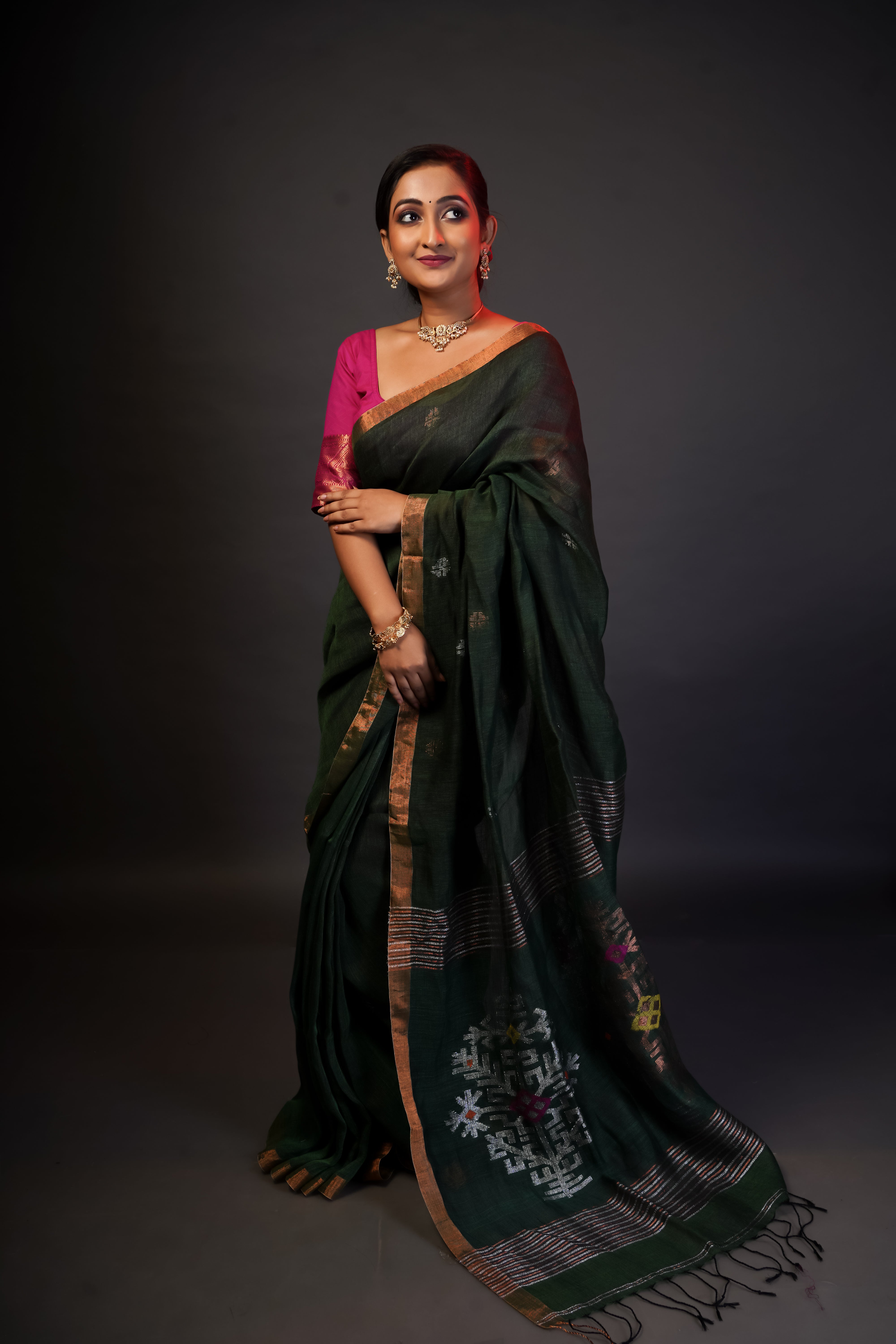 Dark green sawstik linen hand woven jamdani saree