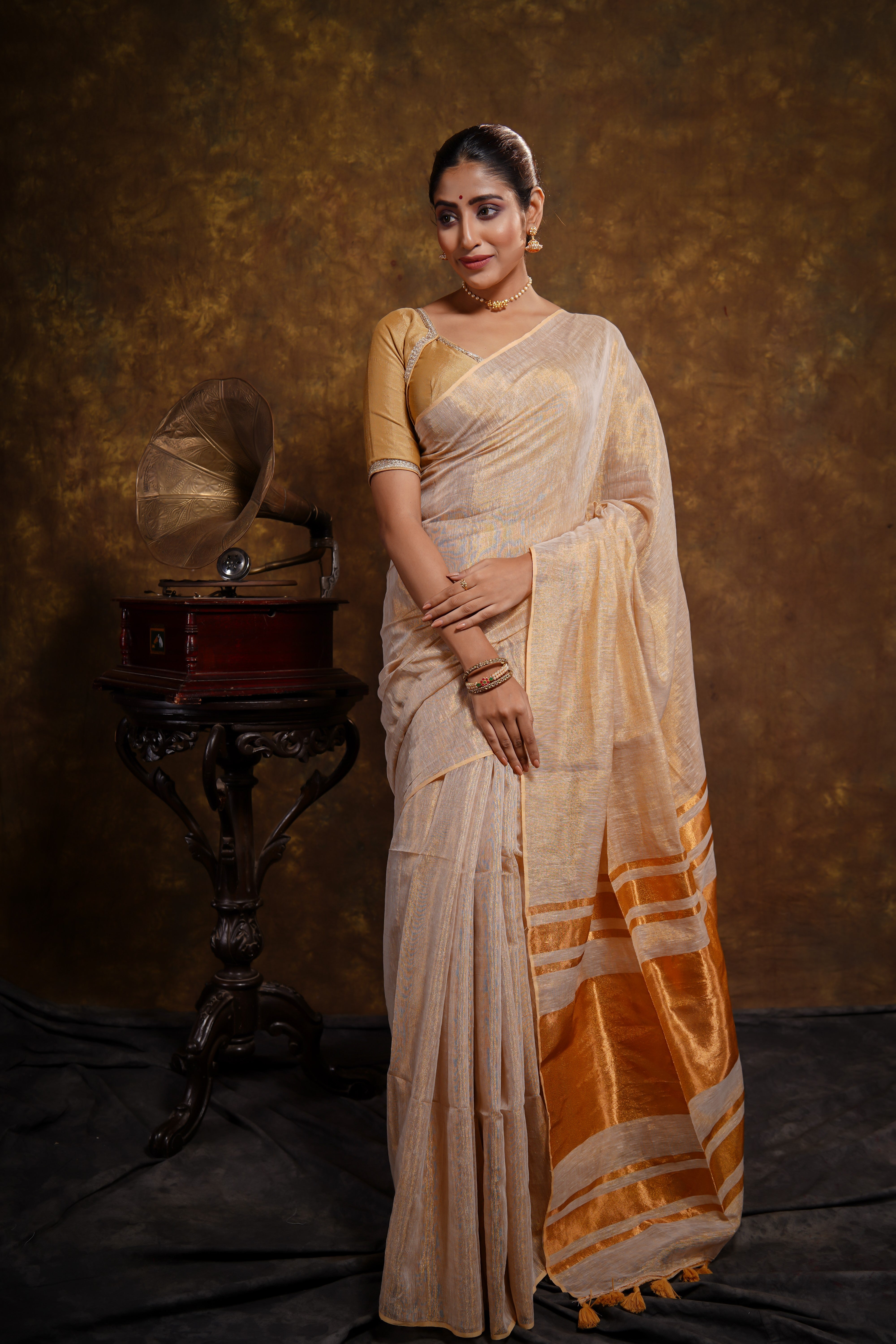 Golden dual tone pure tissue linen saree