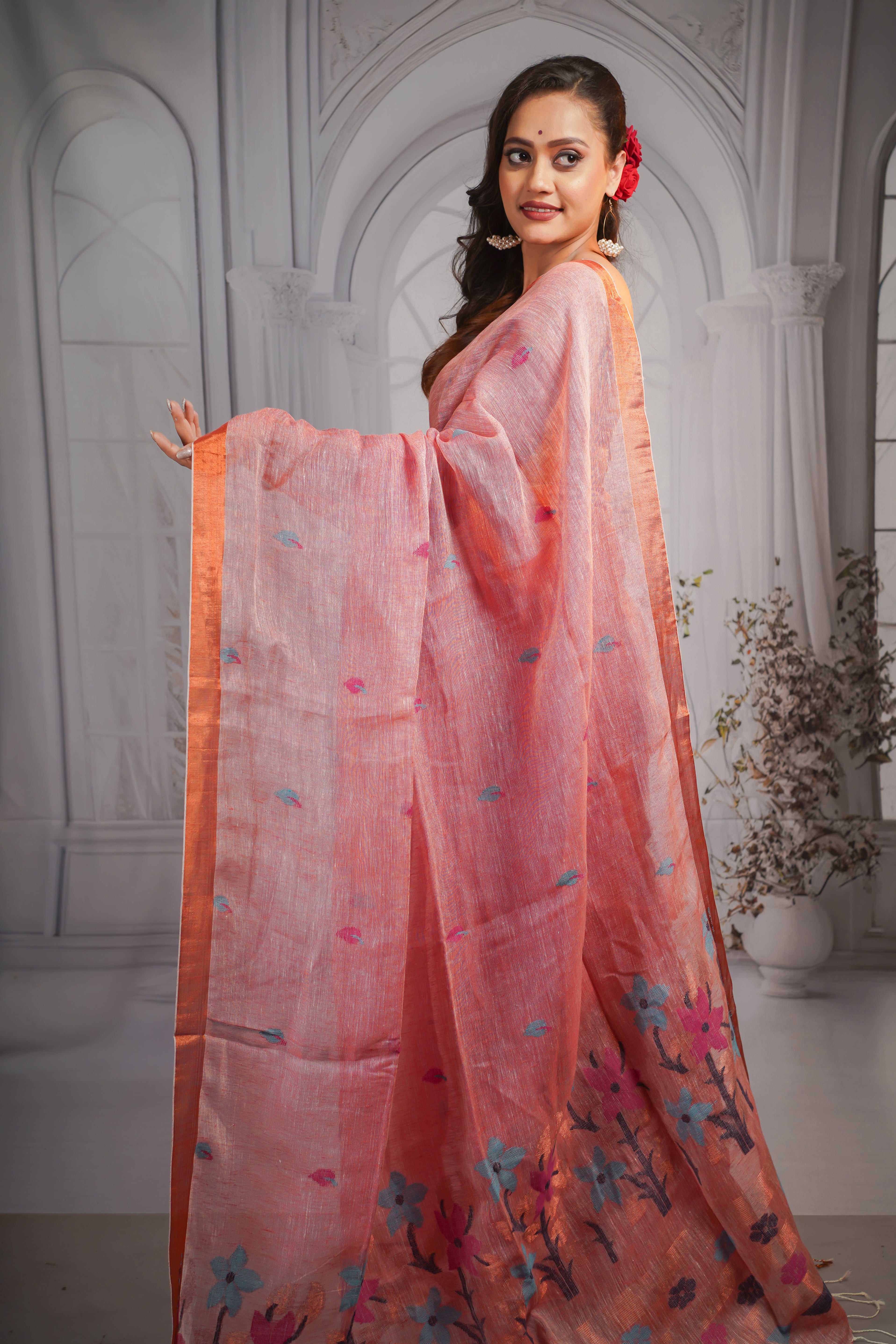 Blashing peach pure linen handwoven jamdani saree