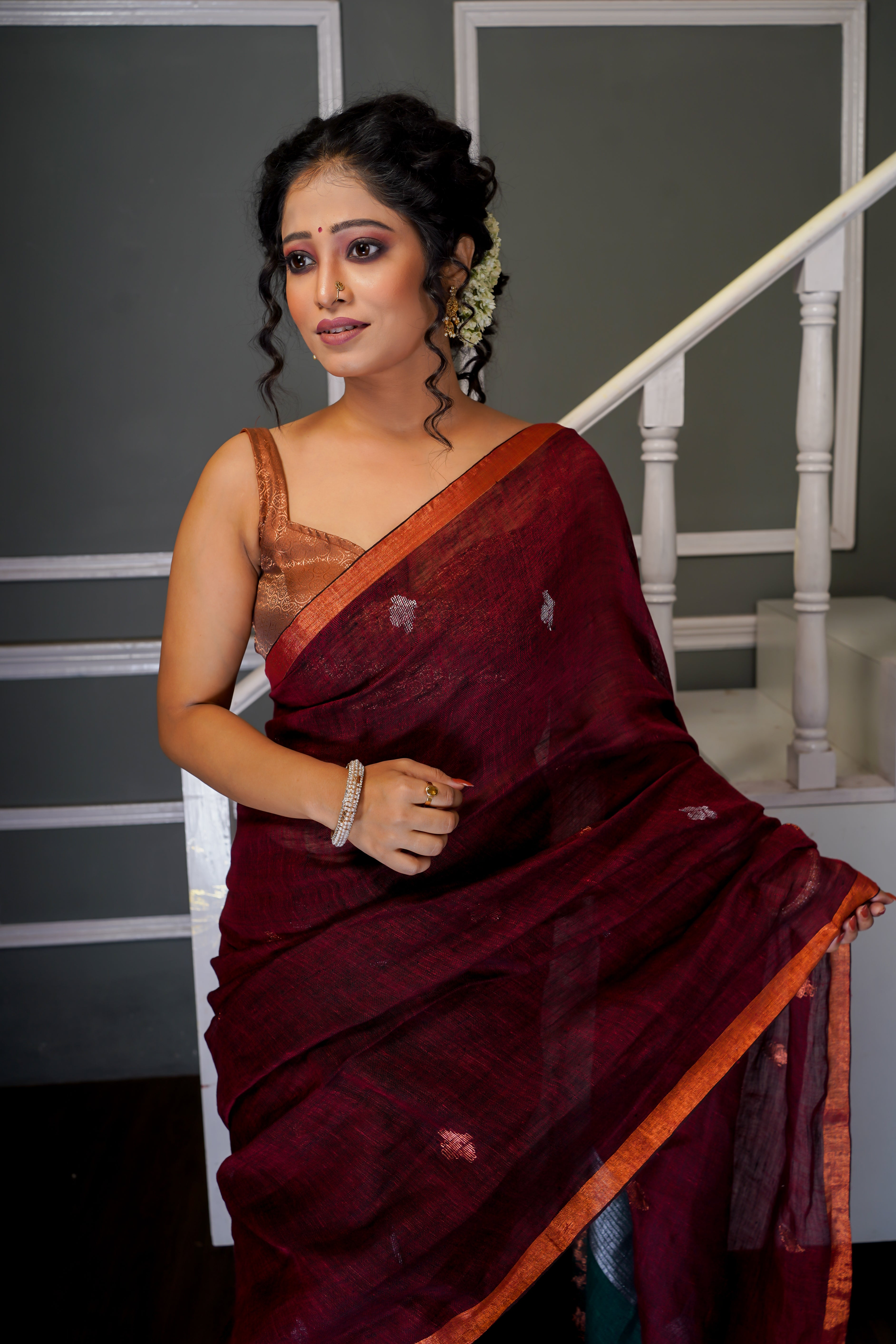 Maroon & Green Sankha linen hand woven jamdani saree