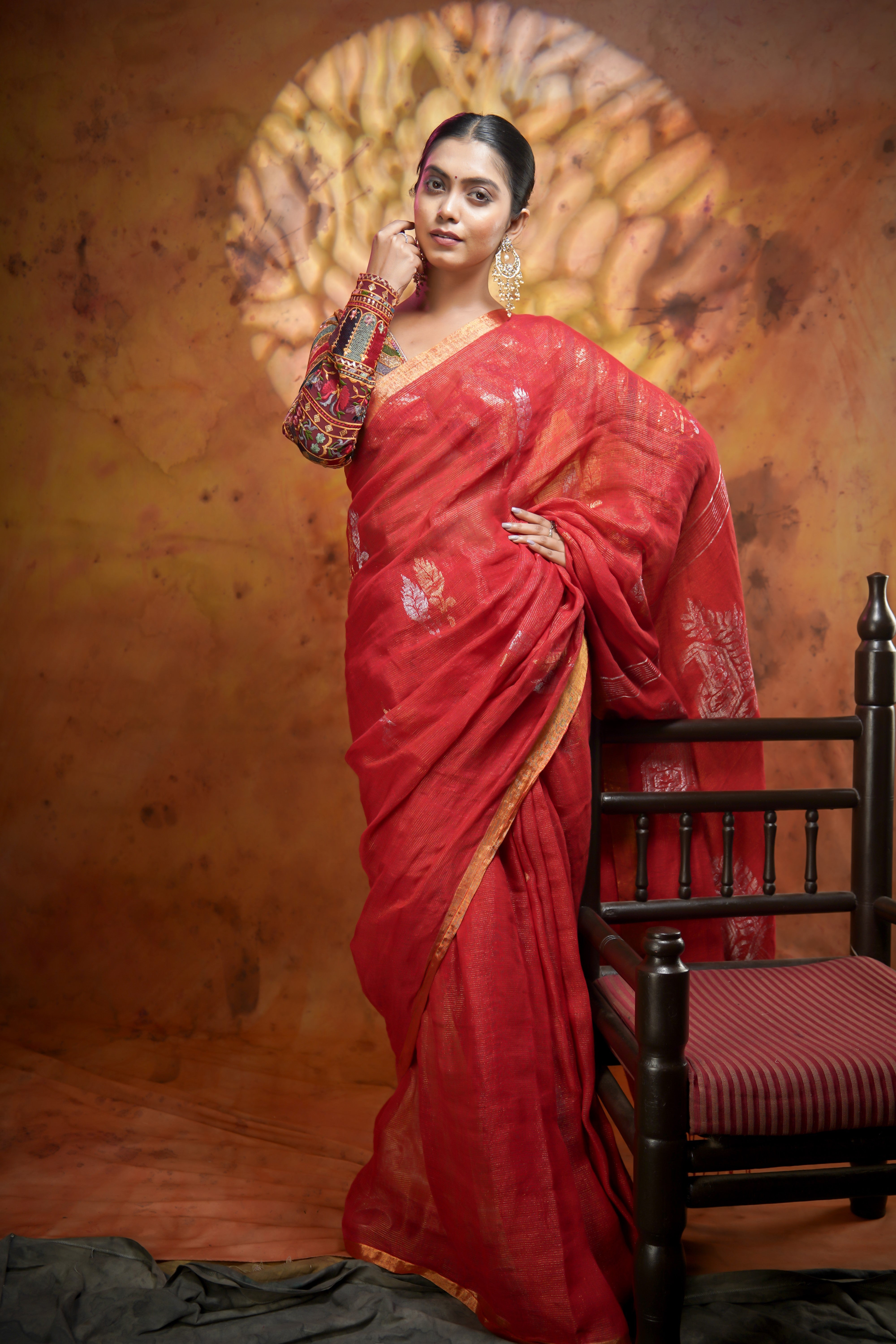 Orange Pure Linen Hand woven Saree with Floral Design