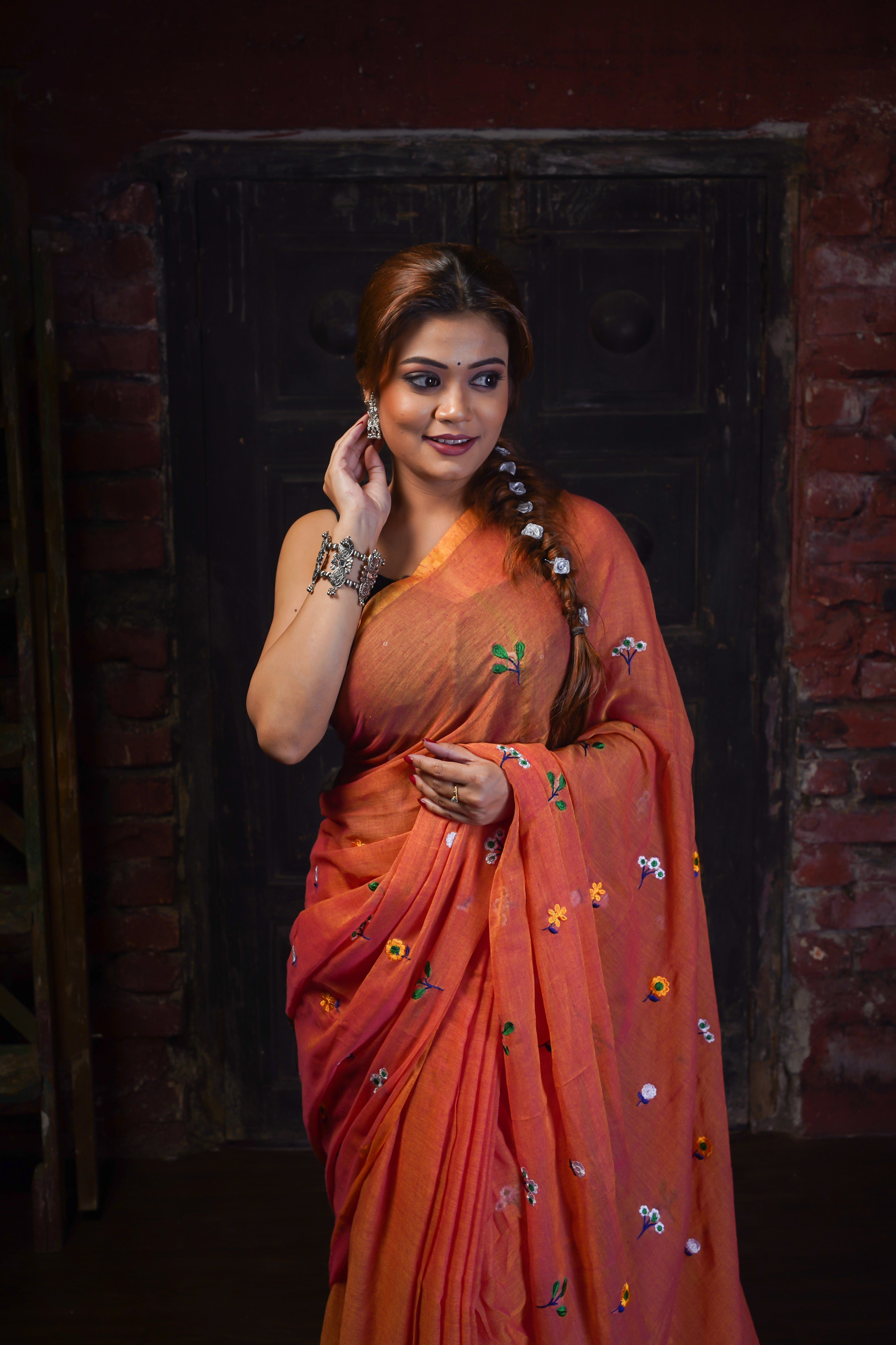 Rust embroidered mulmul cotton saree