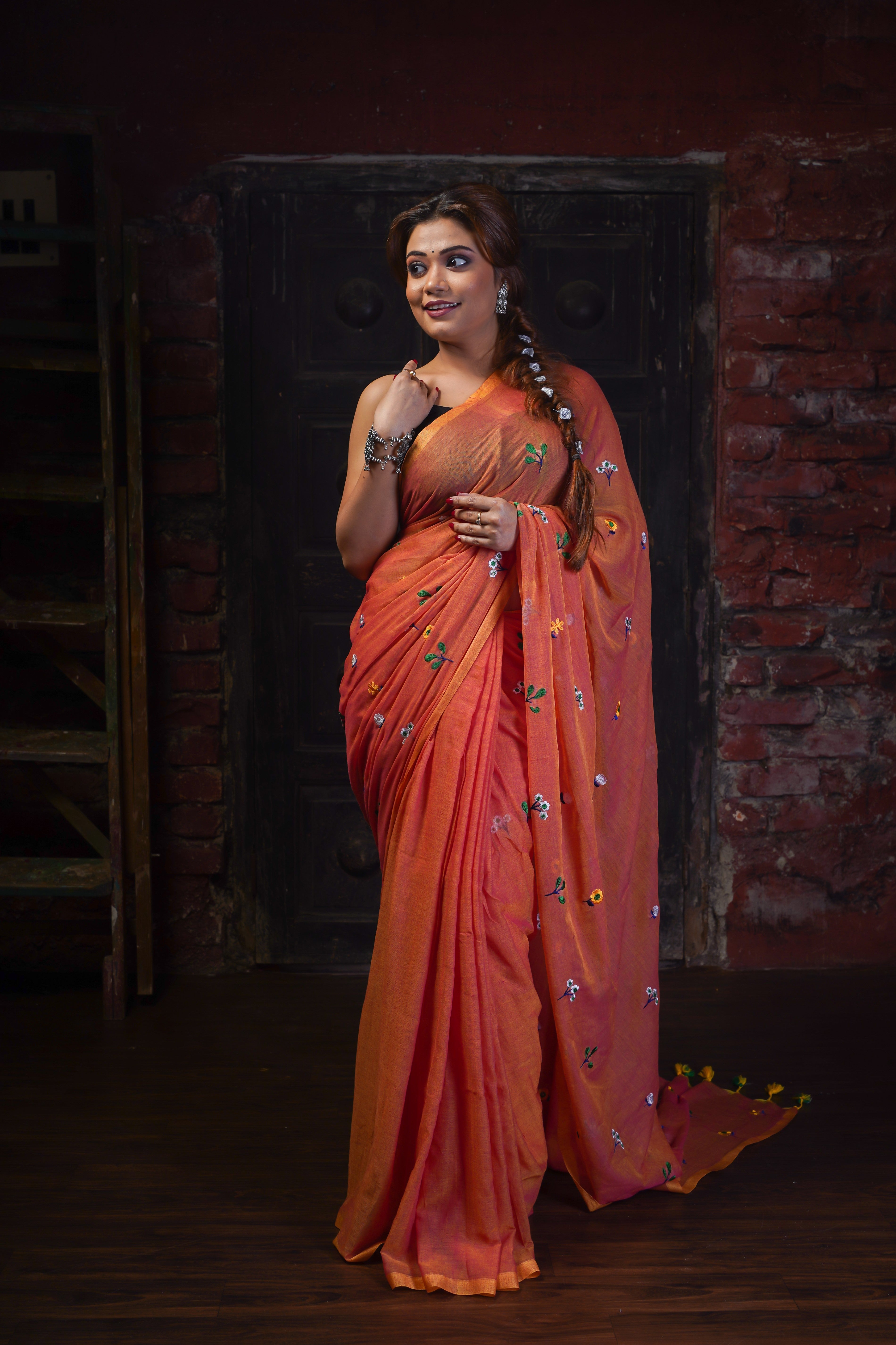 Rust embroidered mulmul cotton saree