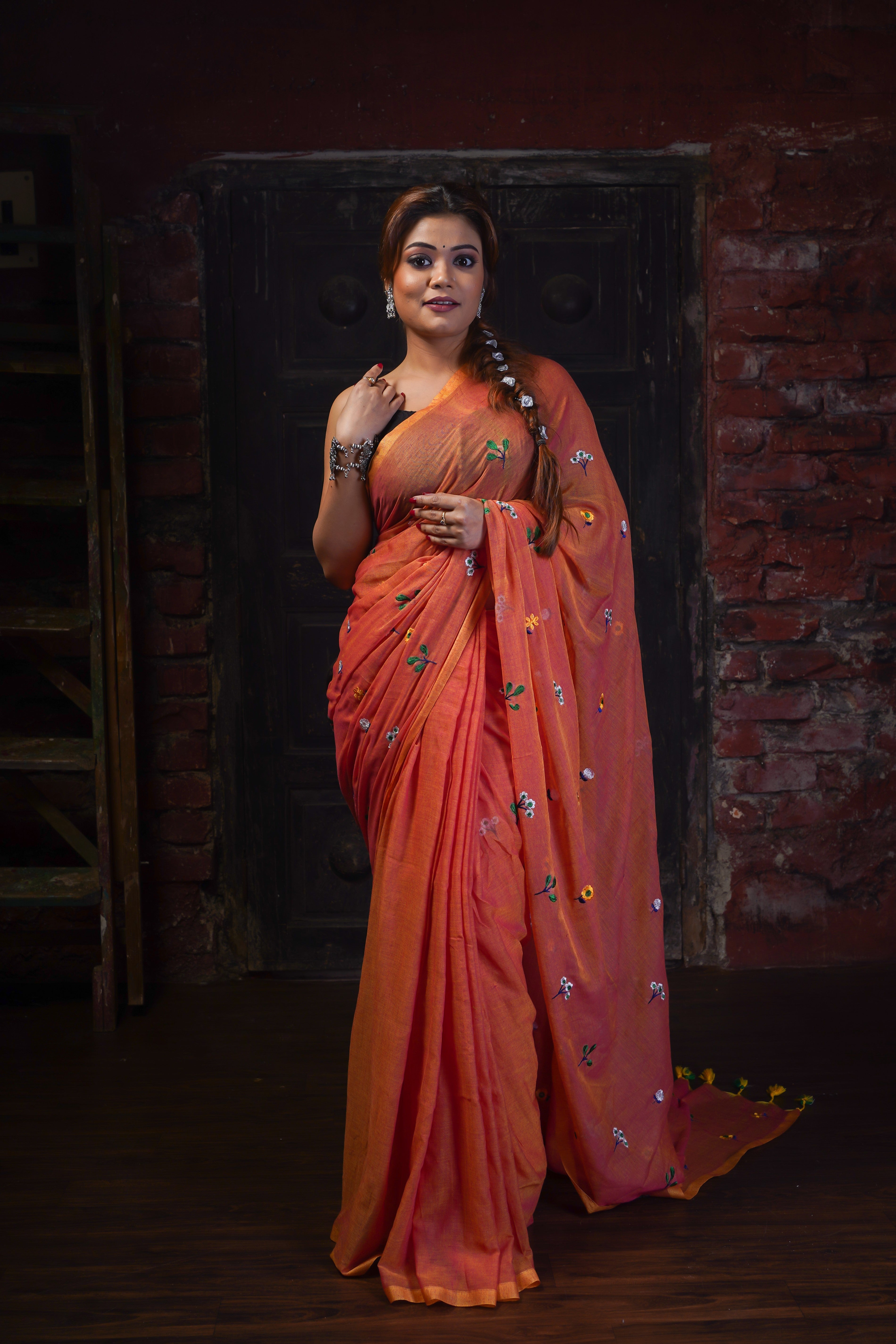 Rust embroidered mulmul cotton saree