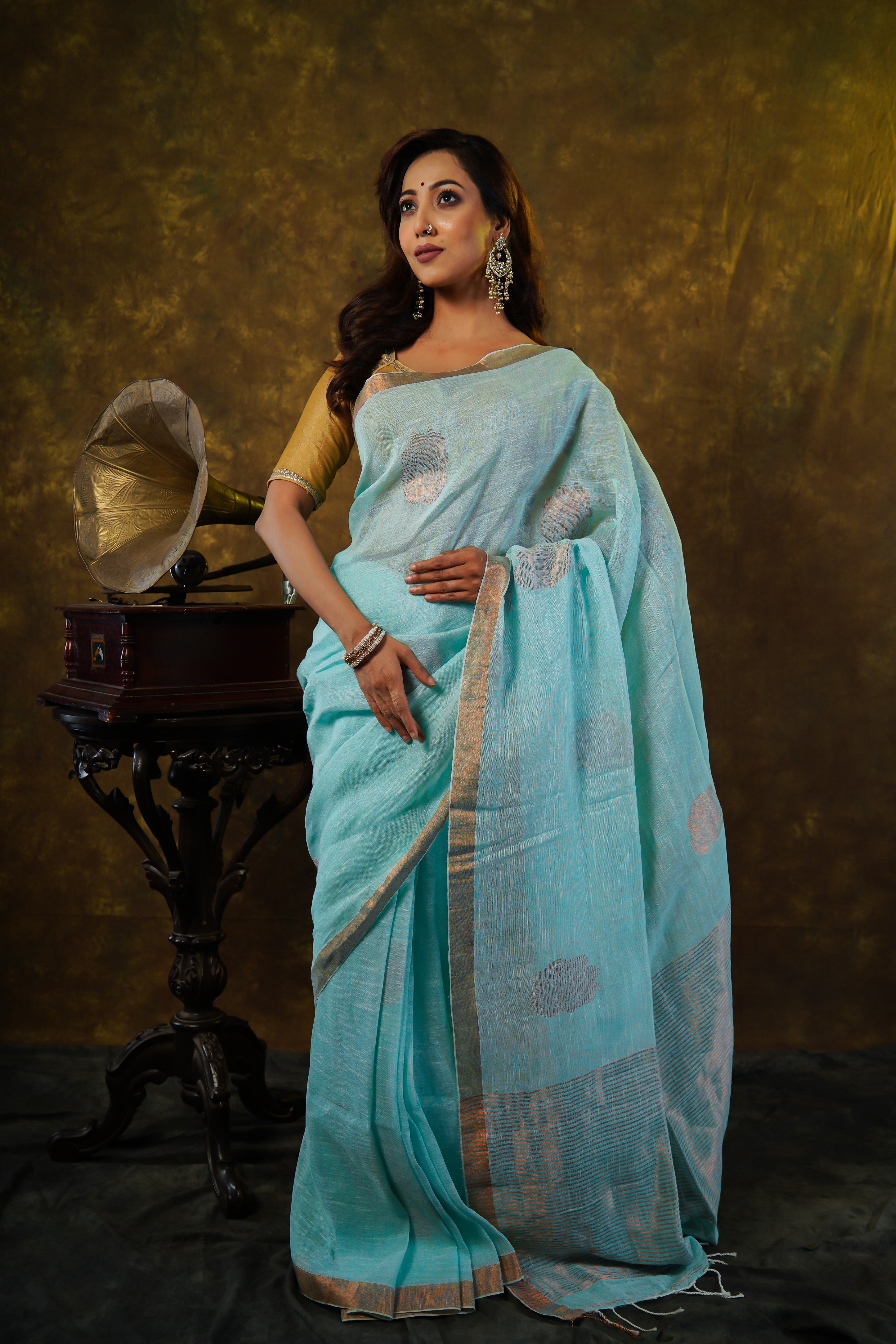 Sky blue Rose motive pure linen hand woven saree