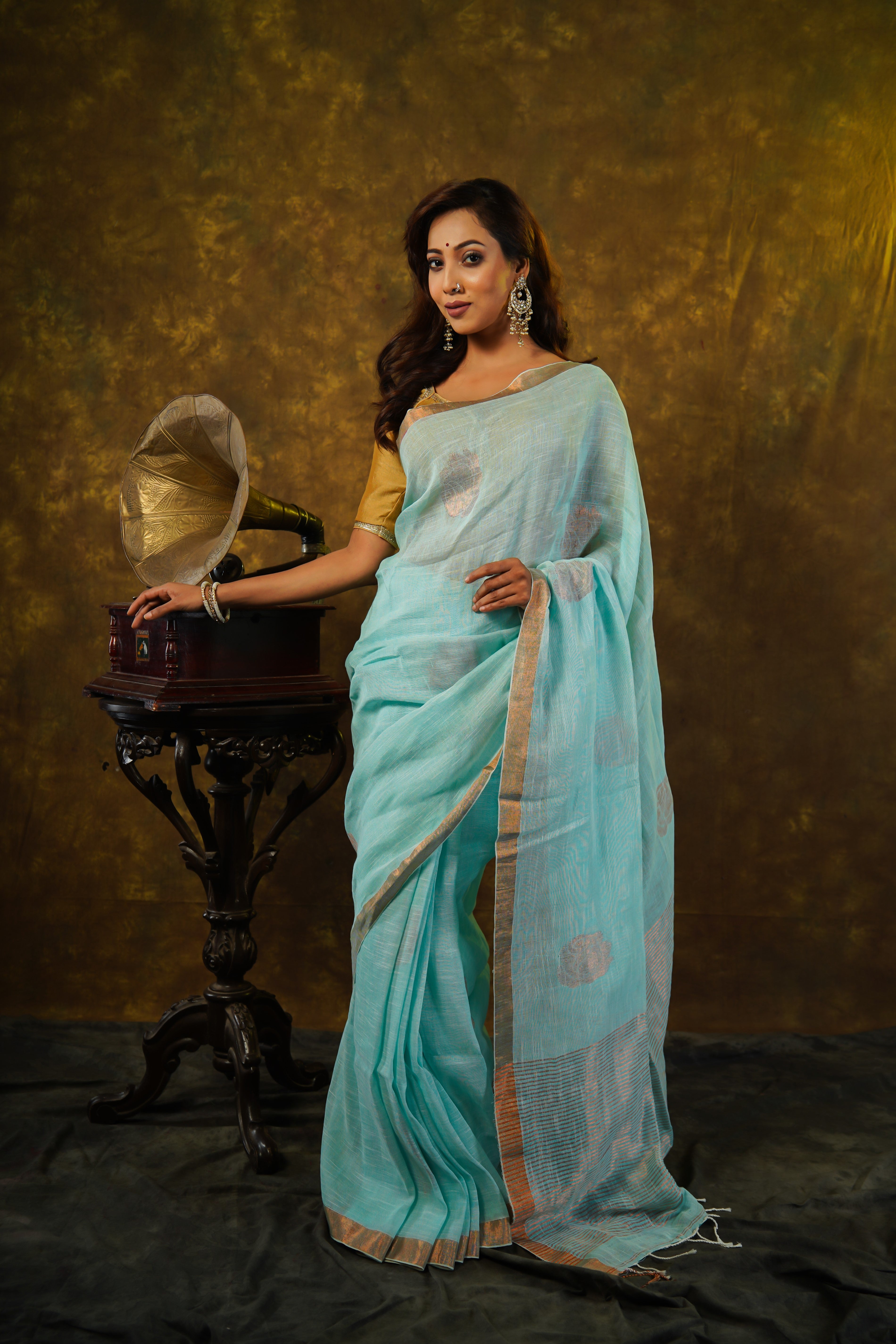 Sky blue Rose motive pure linen hand woven saree