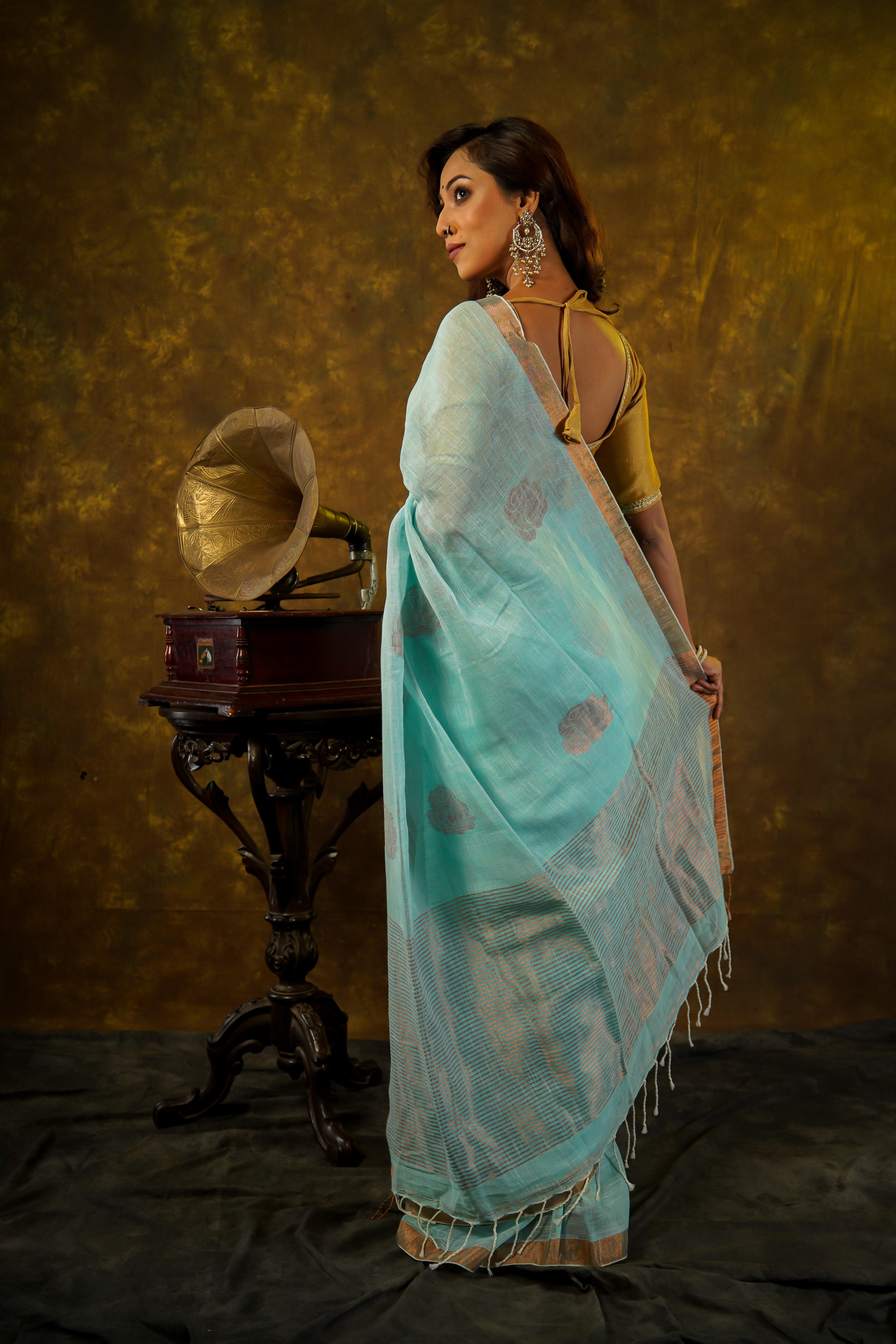 Sky blue Rose motive pure linen hand woven saree