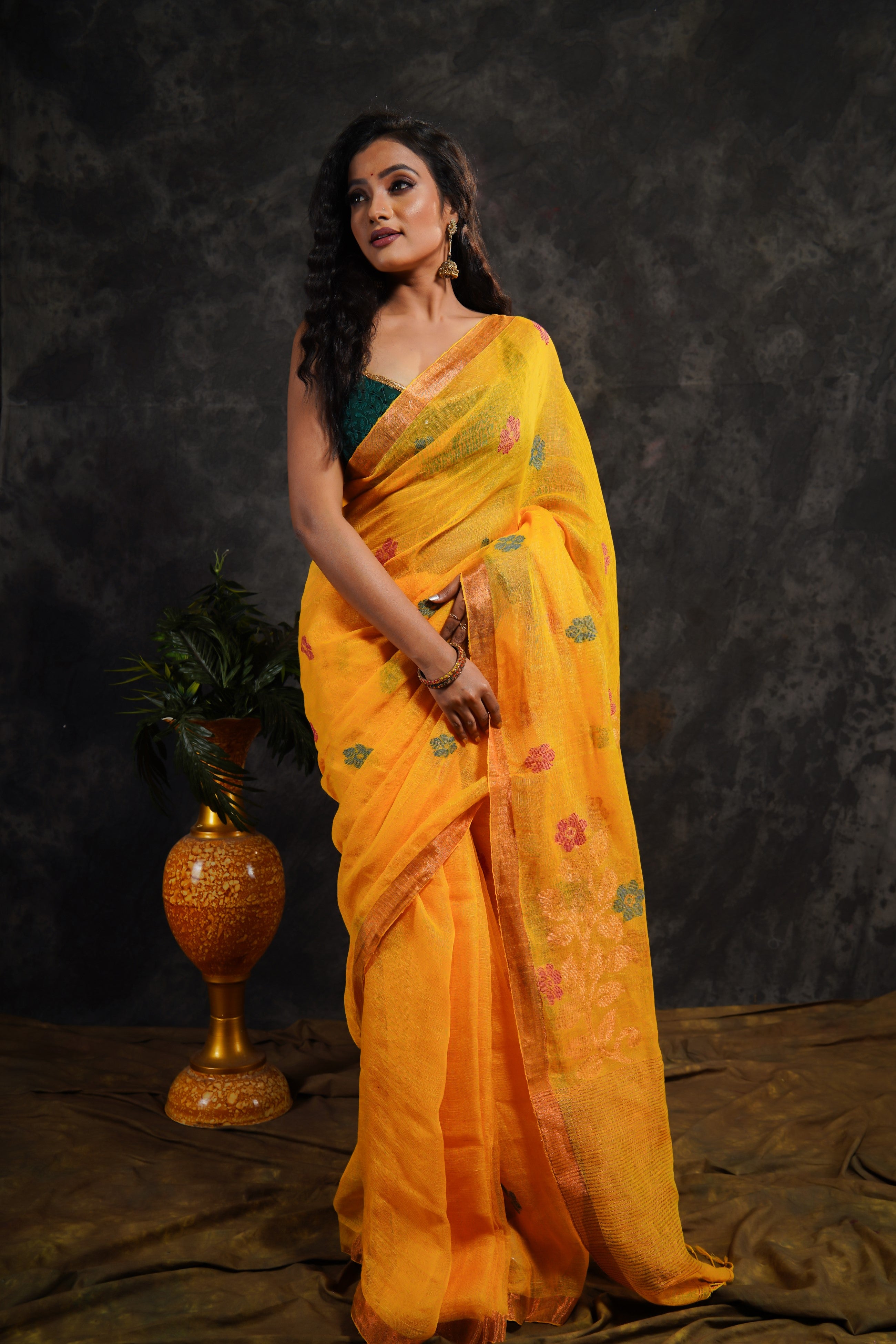 Yellow floral pure Linen hand woven saree